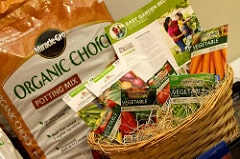 Miracle-Gro Organic Miracle-Gro Organic potting mix and seed packets.